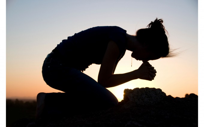 Praying young lady